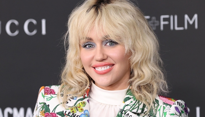 Miley Cyrus on having fun in her 20s and New Year resolution inspired by Dolly Partons husband