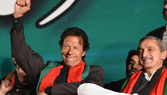 PTI Chairman Imran Khan (left) and Jahangir Khan Tareen. — AFP/File