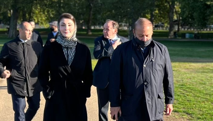 Maryam Nawaz (left) and Nawaz Sharif during a morning walk in London. — Twitter/MaryamNSharif