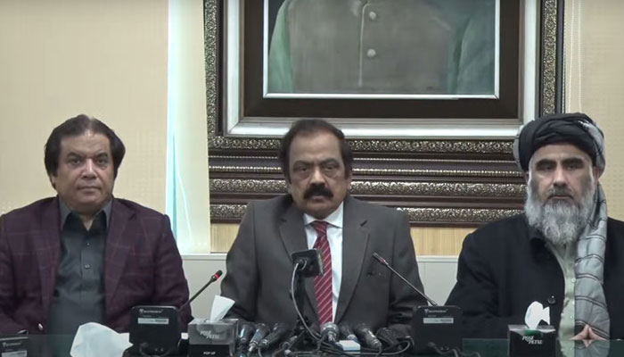 Interior Minister Rana Sanaullah (centre) flanked by PML-N leader Hanif Abbasi (left) and Minister for Religious Affairs and Interfaith Harmony Mufti Abdul Shakoor addresses a presser. — Radio Pakistan.