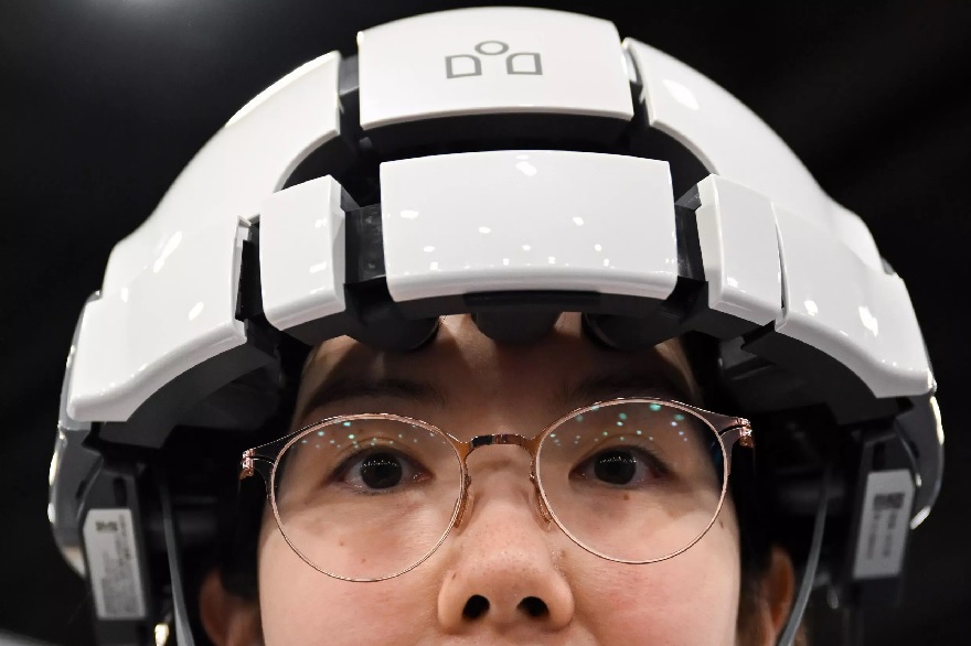 The iSyncWave headset performs brain scans and is touted as being able to diagnose cognitive disorders.— AFP