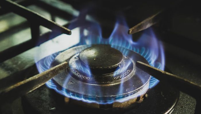 The old gas stove on fire.— Unsplash