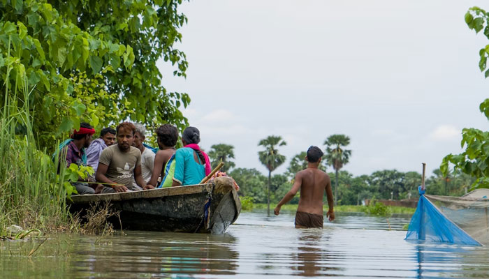 People stranded in the flood of Bihar, India. — Unsplash/File