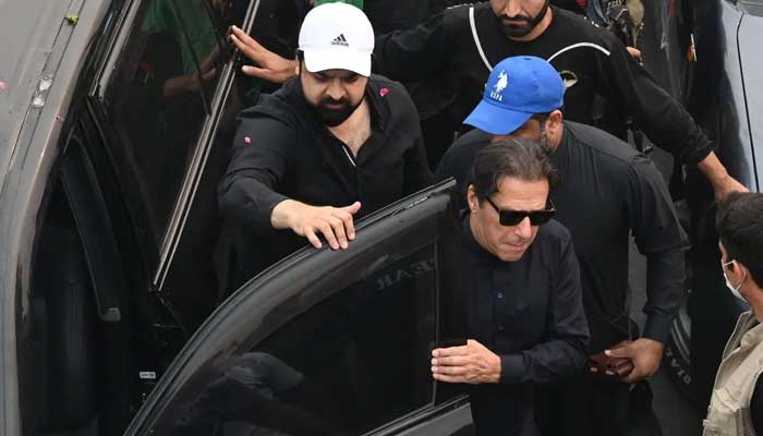 PTI Chief Imran Khan steps out of his vehicles ahead of joining his march, just hours before he was attacked in an attempted assassination. — Twitter/@PTIofficial