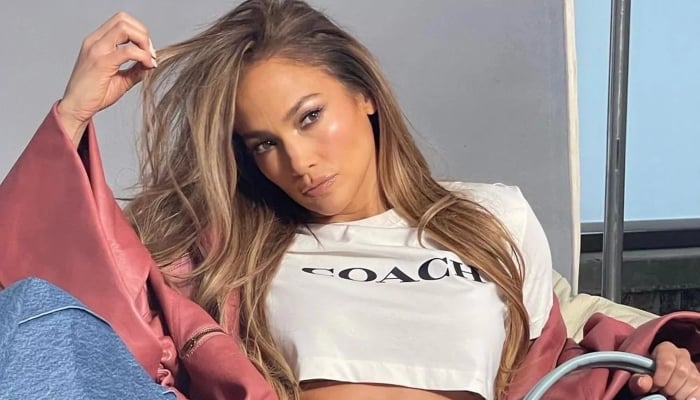 Jennifer Lopez sets pulses racing in pink gym wear as she promotes new drink