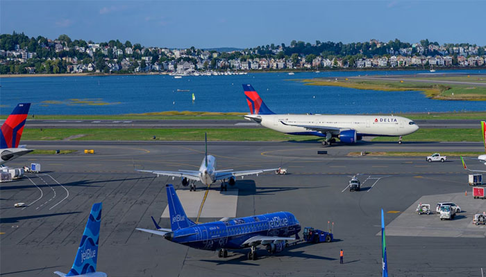 Aeroplanes are parked at the Logan international airport (BOS), Boston, US. — Unsplash