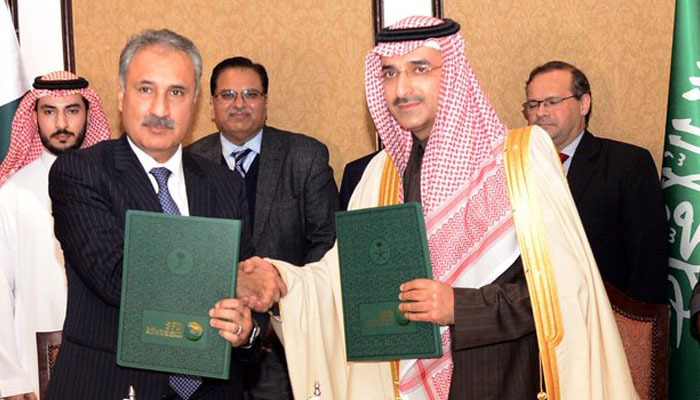 Ministry of Economic Affairs Secretary Kazim Niaz (left) and Saudi Fund for Development CEO Sultan Abdulrahman Al-Marshad shake hands after signing the agreement. — Twitter/@eadgop