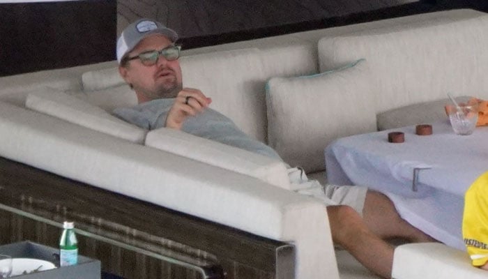 Leo looks tired on a yacht in St Barts during the new year