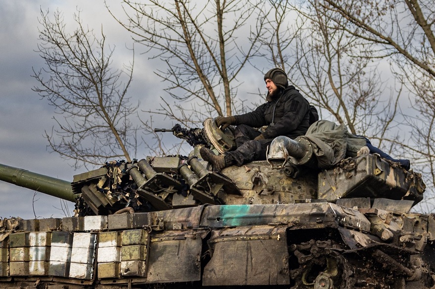 A Ukrainian soldier sits on a T-72 tank near Bakhmut, eastern Ukraine, Dec. 22, 2022.— AFP