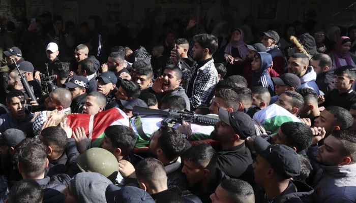 Palestinian mourners and gunmen attend the funeral of Ahmed Abu Junaid, whom the Al-Aqsa Martyrs Brigade claimed as one of its members.— AFP/file