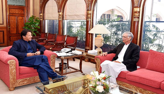 PTI Chairman Imran Khan (left) and Pervez Khattak. — Radio Pakistan/File