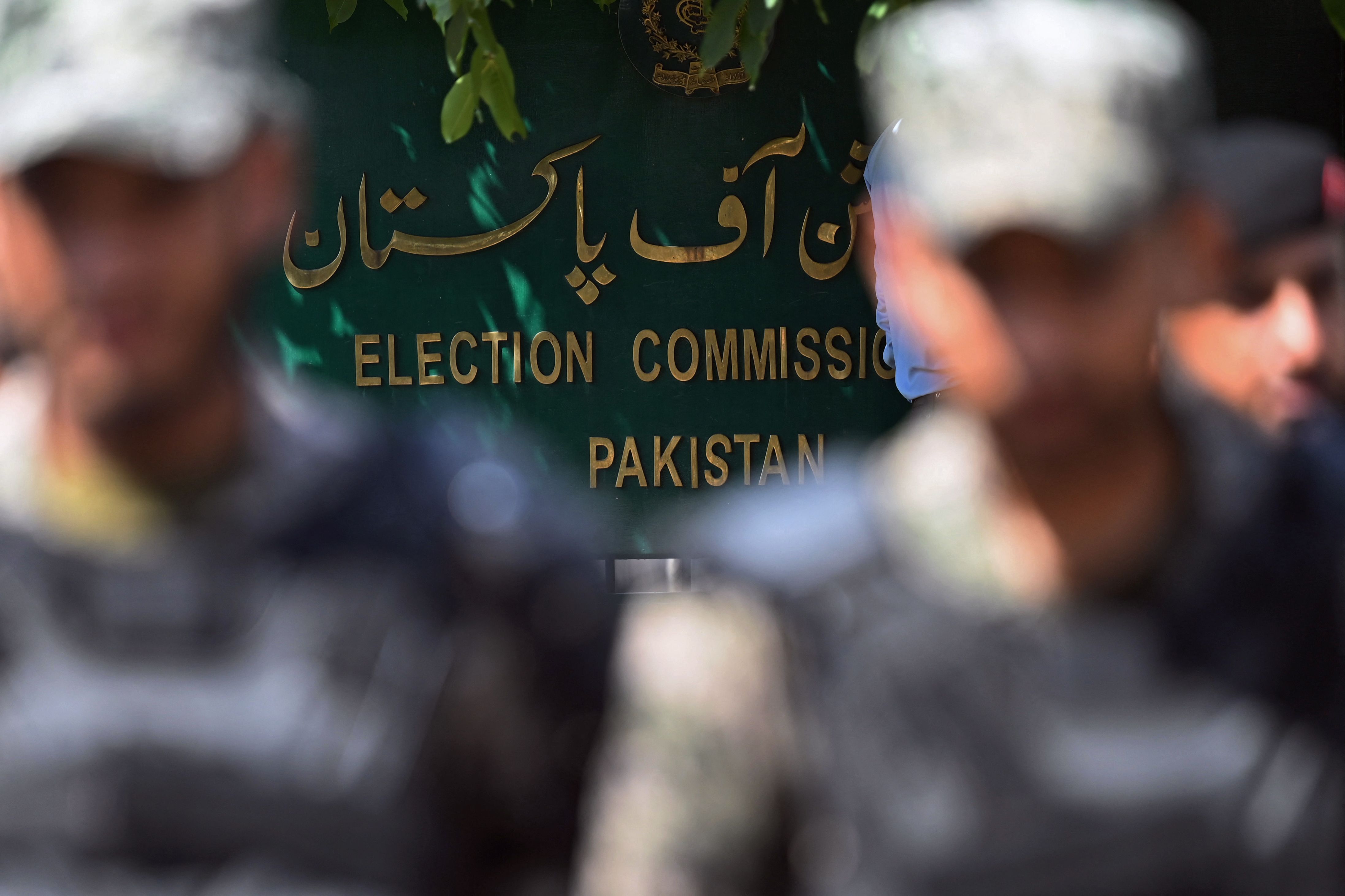 Paramilitary soldiers stand guard outside the Pakistanâ€™s election commission building in Islamabad on August 2, 2022. — AFP