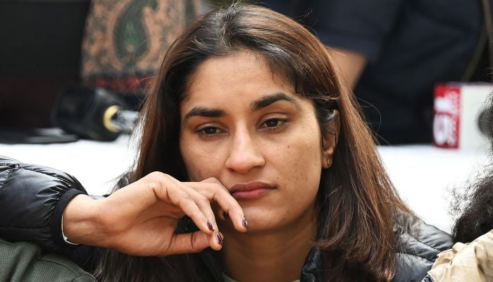 Indian wrestler Vinesh Phogat along with others wrestlers takes part in an ongoing protest against the Wrestling Federation of India (WFI), in New Delhi on January 19, 2023, following allegations of sexual harassment to athletes by members of the WFI.— AFP