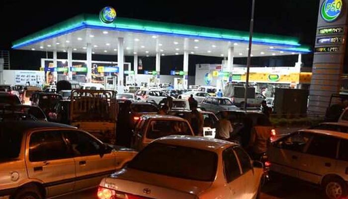 Consumers line up outside a PSO station in this undated photograph. — AFP/File  Govt rubbishes rumours of oil shortage 1032592 3038906 PSO shortage updates