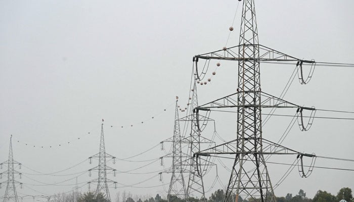 A general view of the high voltage lines during a nationwide power outage in Rawalpindi on January 23, 2023. — AFP