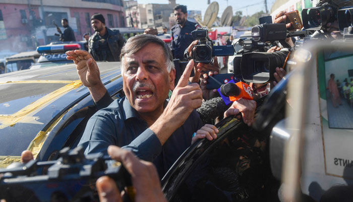 A former police officer Rao Anwar speaks with the media after a court acquitted him over the killing of a shopkeeper in Karachi, on January 23, 2023. — AFP