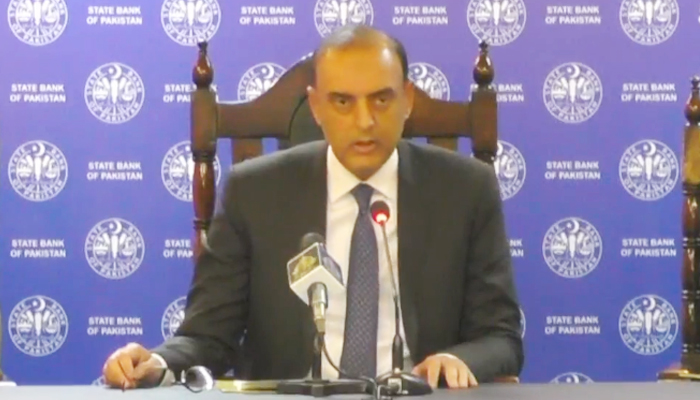 State Bank of Pakistan Governor Jameel Ahmad addresses a press conference in Karachi on January 23, 2023. — Facebook/SBP  SBP raises key interest rate to 25-year high of 17% 1033473 4225318 sbp governor jamil ahmed press conference updates