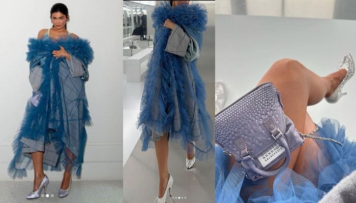 Kylie Jenner slays in blue tulle gown at Paris Fashion Week after posting son Aire’s photo