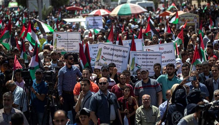 Palestinians during demonstrations in Palestine against the US and Israeli Middle East plan to annex parts of the occupied West Bank and Jordan Valley. — Radio Pakistan /File