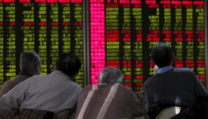 A representational image of investors looking at the digital stock board. — Reuters/File