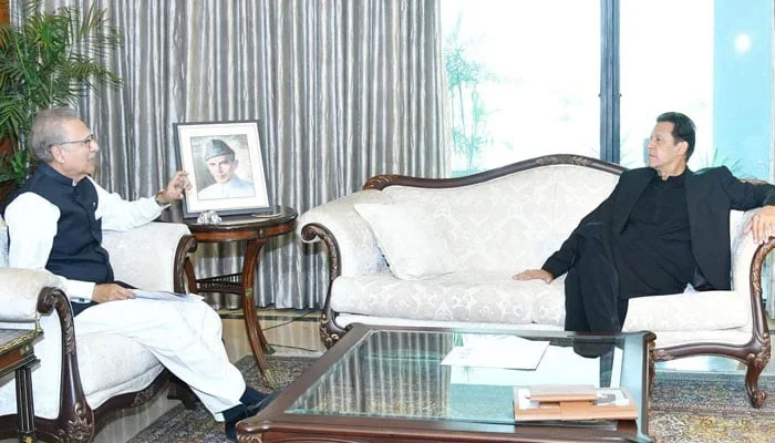 President Dr Arif Alvi (left) meets PTI chief Imran Khan. — Twitter/File