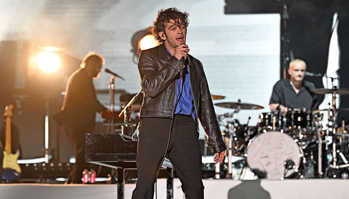The 1975 star Matty Healy cut off by bandmates during live concert as he attempted to make a racial comment