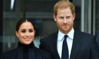 Meghan Markle Keeping Her Head Down To Let Prince Harry Take Center Stage