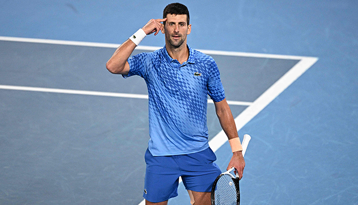 Serbia´s Novak Djokovic celebrates his victory against Greece´s Stefanos Tsitsipas during the mens singles final on day fourteen of the Australian Open tennis tournament in Melbourne on January 29, 2023. — AFP