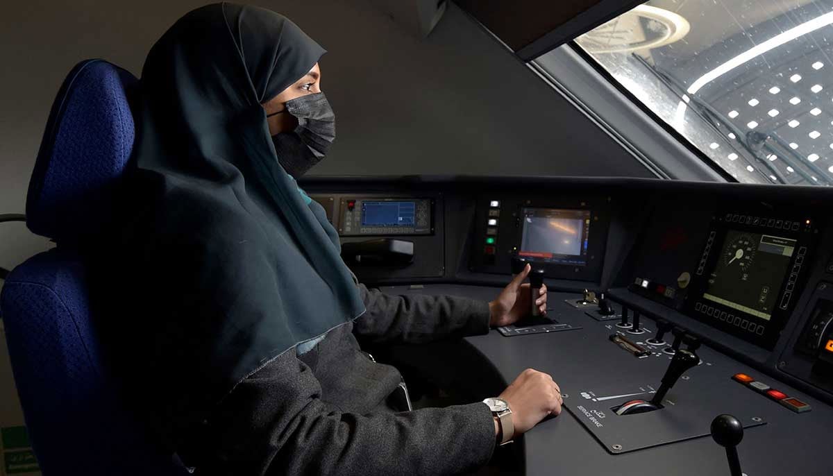 Raneem Azzouz, drives the high-speed train ferrying pilgrims to Makkah. — AFP