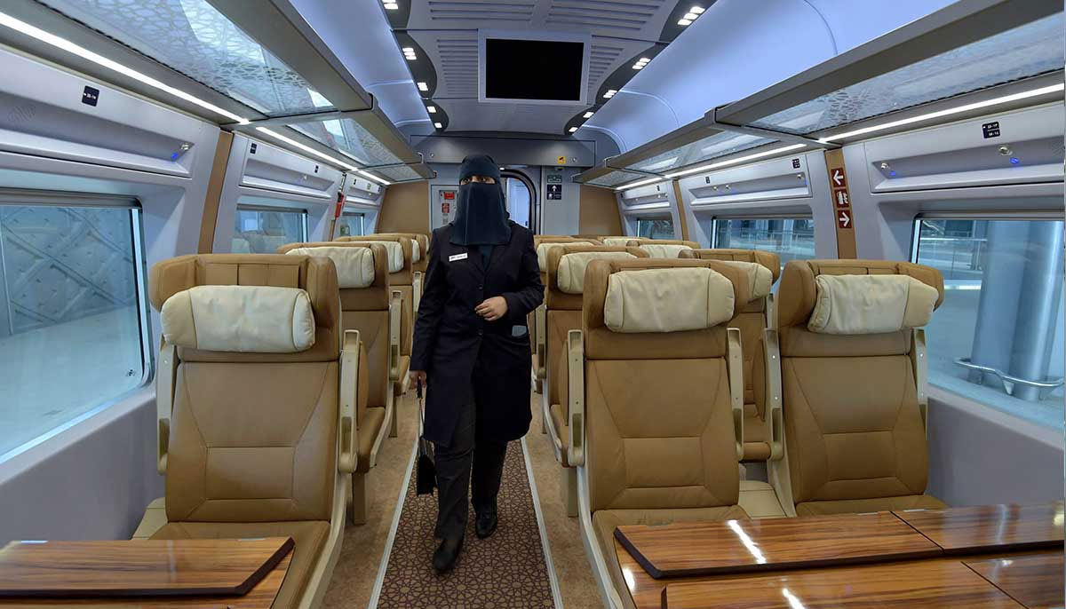 Saudi conductor Tharaa Ali is pictured in one of the wagons of the high-speed. — AFP