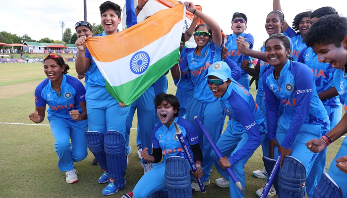 The victorious Indian team pose after clinching the Under-19 Womens T20 World Cup, India vs England, U-19 Womens T20 World Cup, final, Potchefstroom, January 29, 2023. — AFP