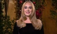 Adele reveals her 'favourite childhood memory' with estranged father Mark Evans