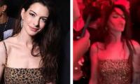 Anne Hathaway shakes a leg at after-party of Valentino show 