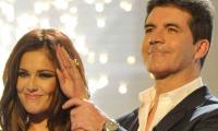 Simon Cowell reportedly helping pal Cheryl to adopt a baby
