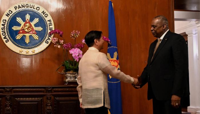 Philippine President Ferdinand Marcos Jr (left) greets US Secretary of Defense Lloyd Austin before a meeting at the Malacanang Palace in Manila.— AFP/file