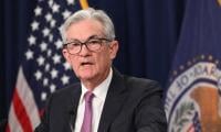 US Fed unveils smaller rate hike but signals inflation fight not over