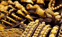 Gold dazzles as rupee rout continues