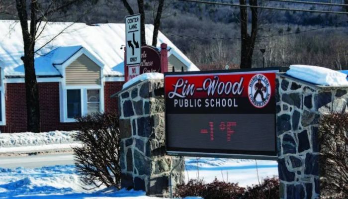 The temperature of minus 1 F (minus 17 C) is displayed at a school in Lincoln, New Hampshire on Saturday, Feb. 4, 2023.— AFP