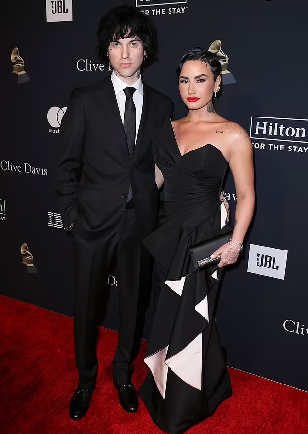 Demi Lovato oozes glam in black as she attends pre-Grammy gala with Jordan Lutes