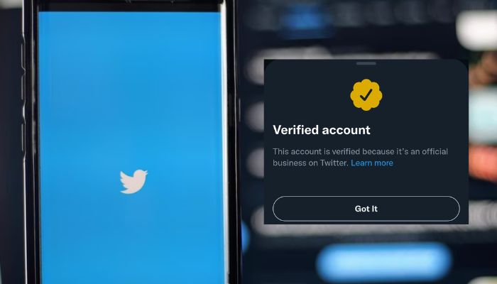 Image shows a smartphone with Twitter logo on it beside a screenshot of Twitter verified account.— Unsplash, Twitter/@ATFujoshi
