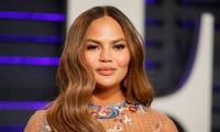 Chrissy Teigen prefers spending time with newborn daughter over attending the 2023 Grammys