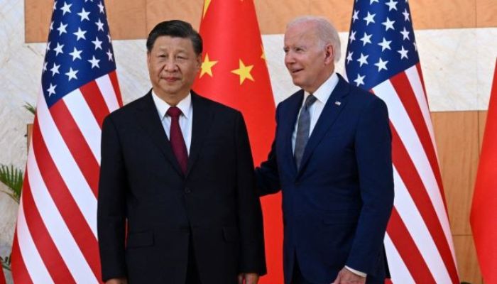 US President Joe Biden (R) and Chinas President Xi Jinping (L) meet on the sidelines of the G20 Summit in Nusa Dua on the Indonesian resort island of Bali on November 14, 2022.— AFP