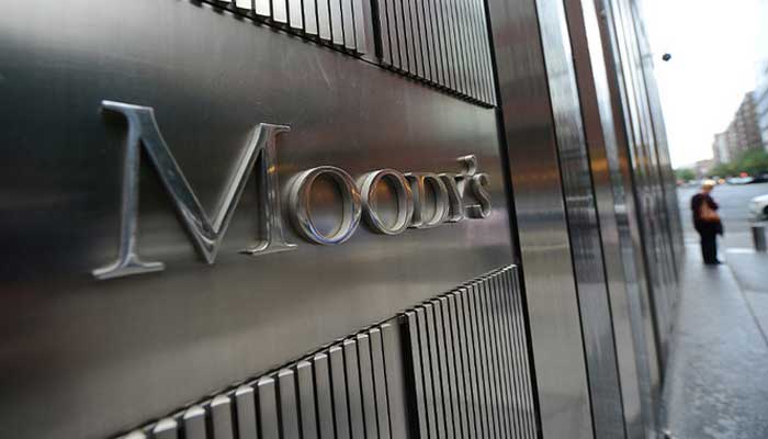 A sign for Moodys rating agency stands in front of the company headquarters in New York, September 18, 2012. - AFP/ File