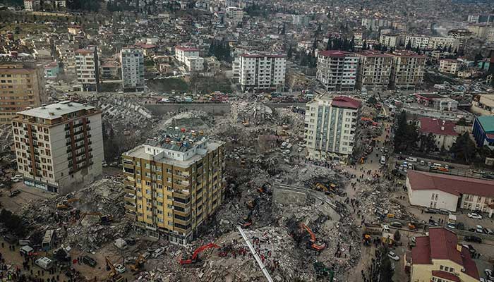 This aerial view shows collapsed buildings during the ongoing rescue operation in Kahramanmaras, the epicentre of the first 7.8-magnitude tremor five days ago, in southeastern Turkey, on February 10, 2023. — AFP/File