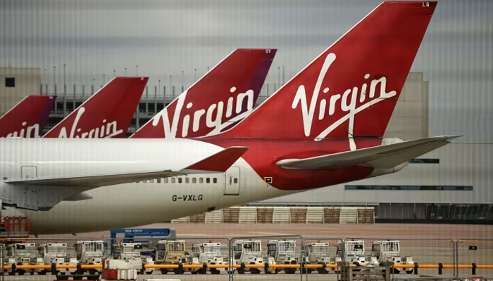 Virgin Atlantic aircraft can be seen at an airport. — AFP/File