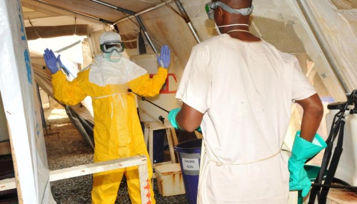 Marburg fever is a close relative of Ebola. Pictured: Medical staff wear protective gear during a deadly Ebola epidemic that struck Guinea in 2015.— AFP/file