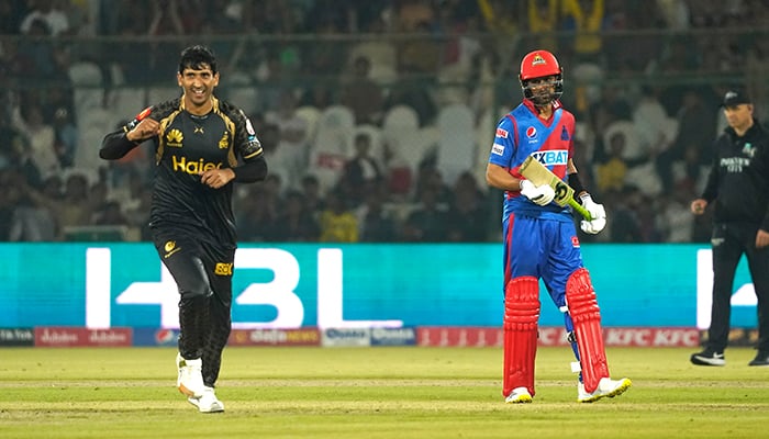 Salman Irshad celebrates after taking a wicket during Peshawar Zalmis match against the Karachi Kings at the National Bank Cricket Arena in Karachi, on February 14, 2023. — PSL