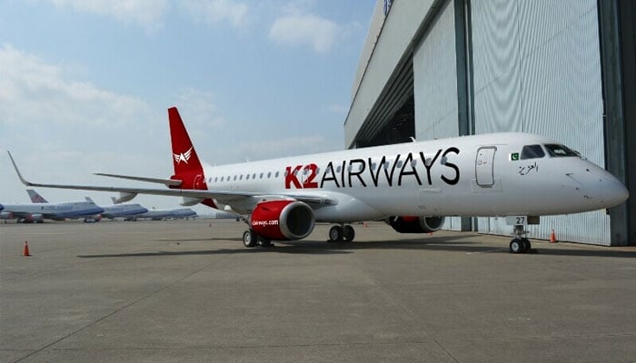 K2 Airways Embraer E-Jet parked at a terminal. — K2 Airways