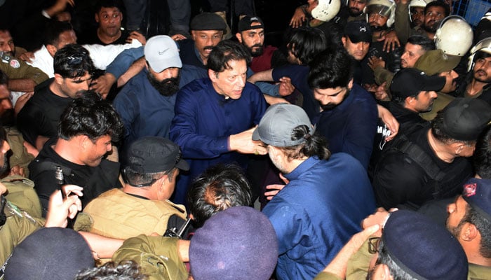 Former prime minister Imran Khan arrives at Lahore High Court for a case hearing on his bail application on Monday, February 20, 2023. — PPI