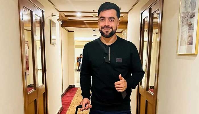 Lahore Qalandars all-rounder Rashid Khan poses with a thumbs up after checking in Pakistan. — Instagram/@lahoreqalandars